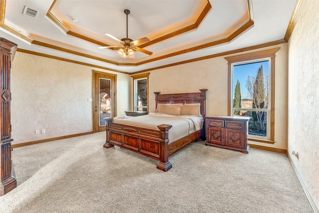 carpeted bedroom featuring ceiling fan, access to outside, ornamental molding, and a raised ceiling