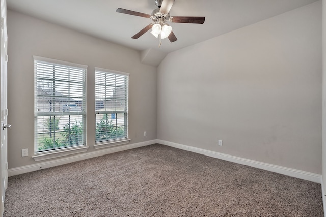 spare room with ceiling fan and carpet flooring