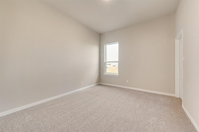 unfurnished room featuring carpet floors