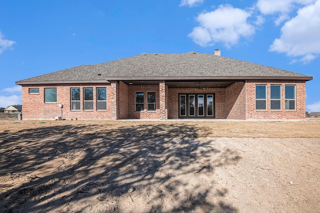 rear view of house featuring a patio area and ceiling fan