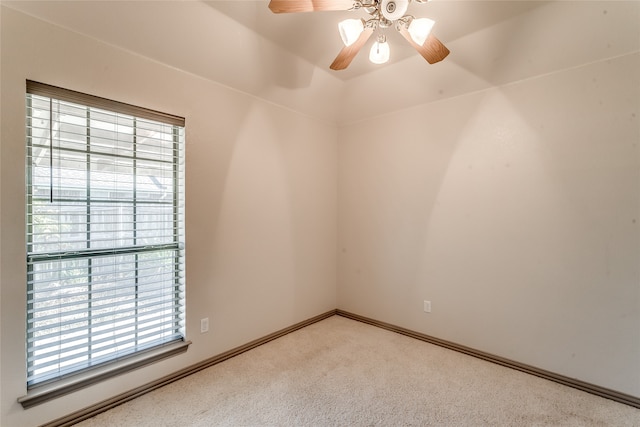 carpeted empty room with ceiling fan