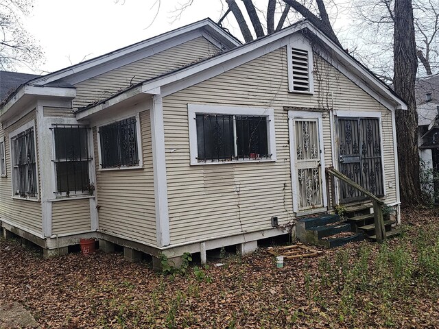 view of home's exterior featuring entry steps