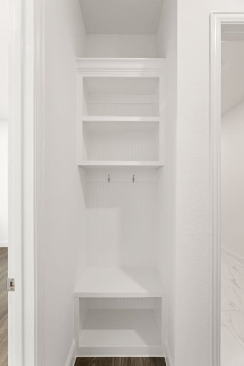 mudroom featuring wood-type flooring