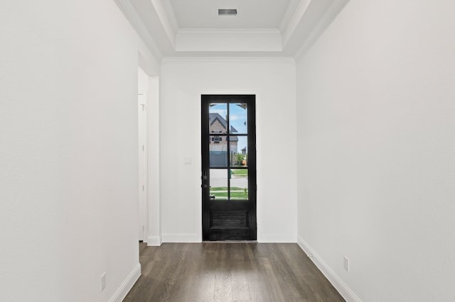 entryway with dark hardwood / wood-style flooring and crown molding