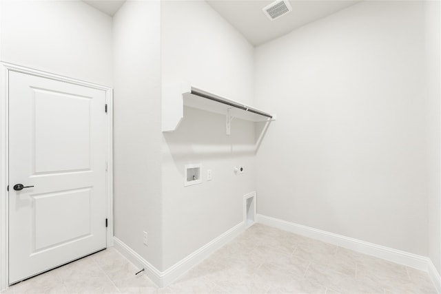 laundry room featuring washer hookup, visible vents, hookup for an electric dryer, gas dryer hookup, and laundry area