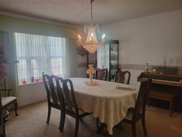 carpeted dining space featuring a textured ceiling and an inviting chandelier