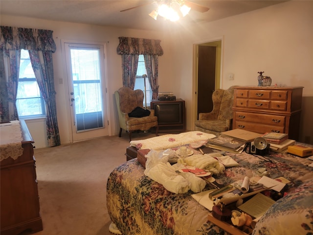 bedroom featuring ceiling fan and carpet floors