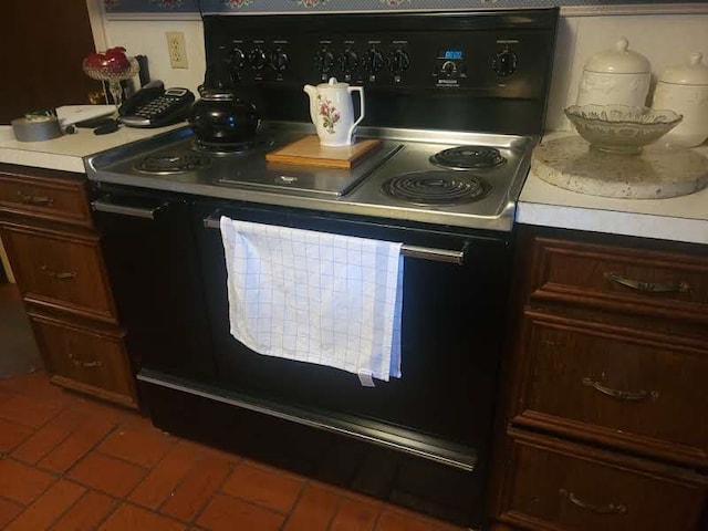 kitchen with electric range oven