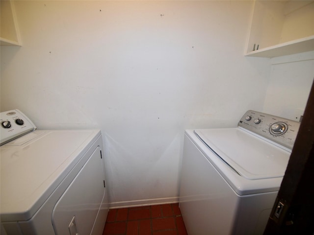 1505 S Rodgers Dr, Graham, TX 76450 - laundry room with washer and dryer and baseboards