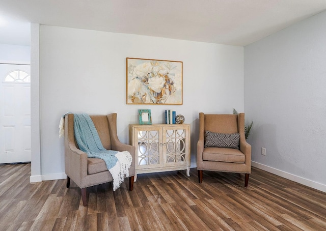 living area featuring dark hardwood / wood-style floors