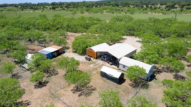 birds eye view of property with a rural view