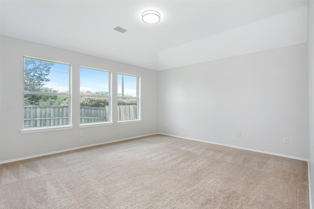 view of carpeted spare room