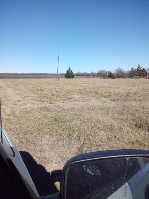 view of yard featuring a rural view