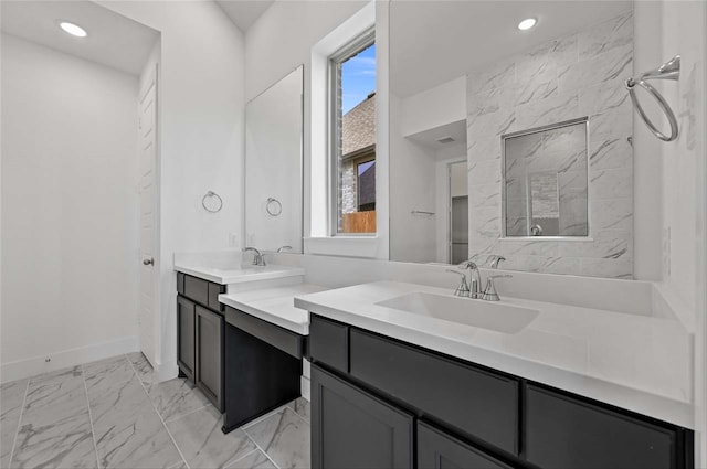 bathroom featuring tile patterned flooring, a wealth of natural light, and vanity