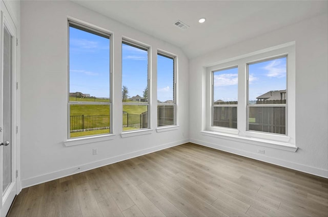 empty room with light wood-type flooring