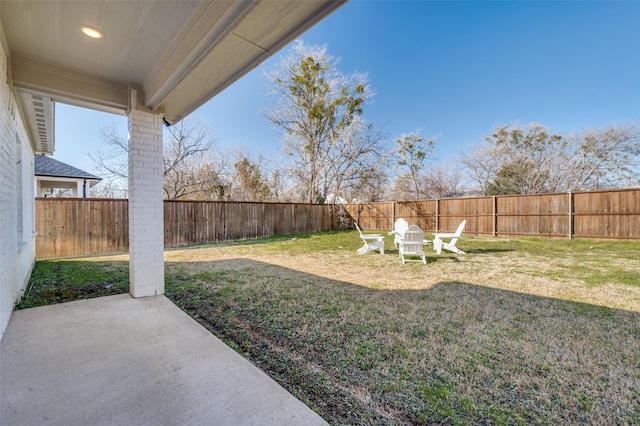 view of yard featuring a fenced backyard and a patio