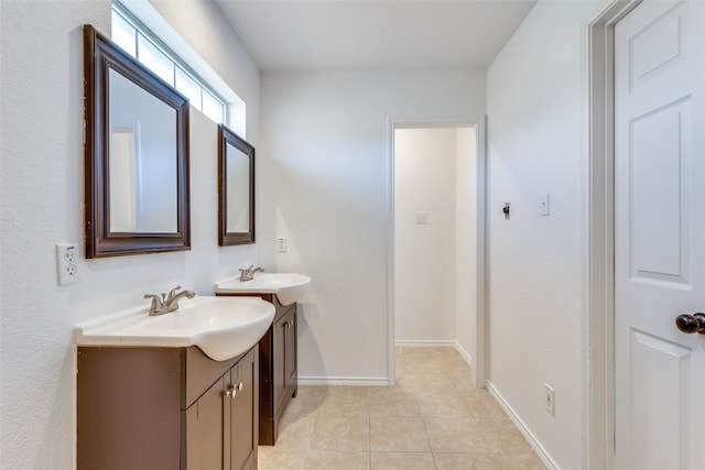 bathroom with tile flooring and vanity