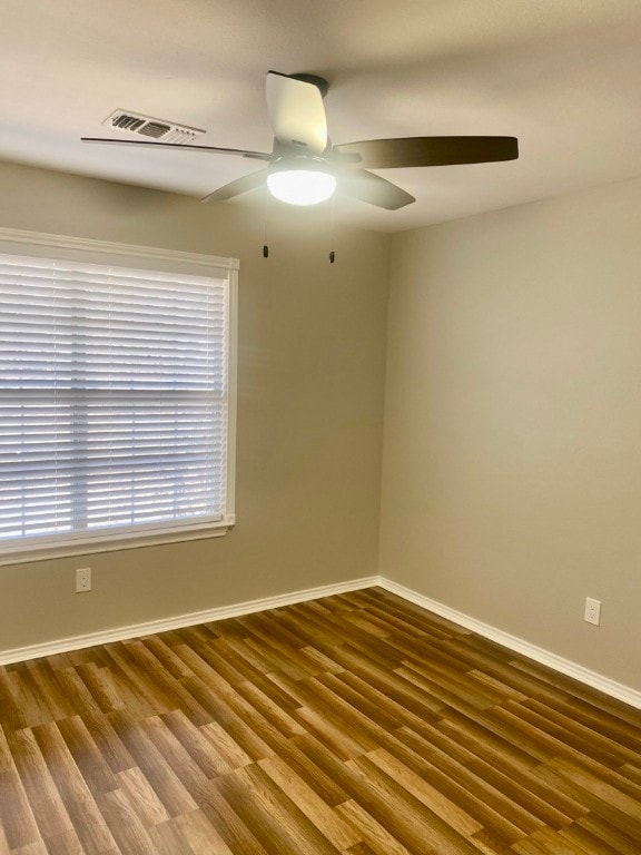 unfurnished room featuring wood-type flooring and ceiling fan