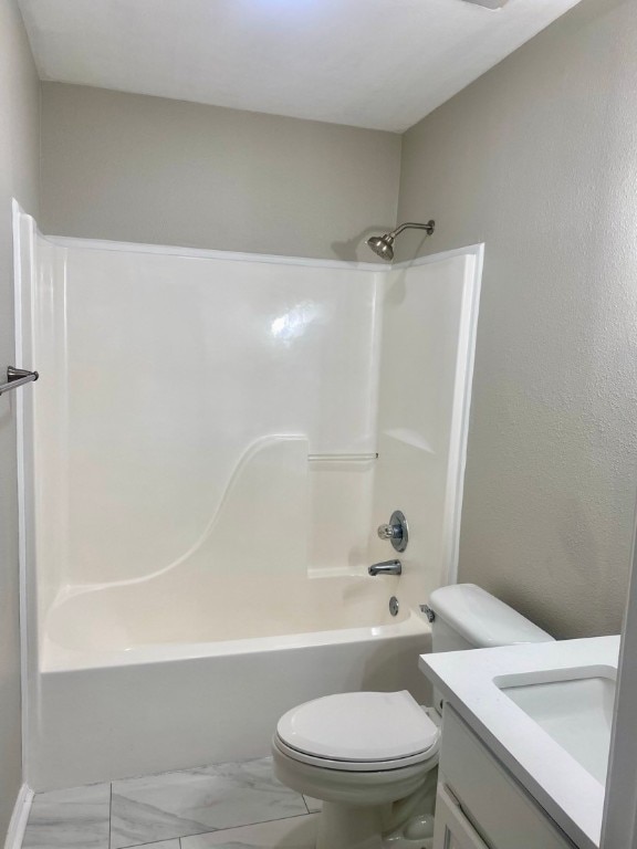 full bathroom featuring toilet, tile flooring, shower / bath combination, and vanity