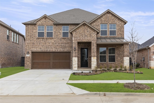 craftsman house featuring a garage and a front yard