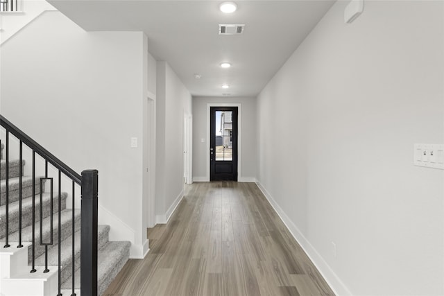 doorway to outside featuring hardwood / wood-style floors