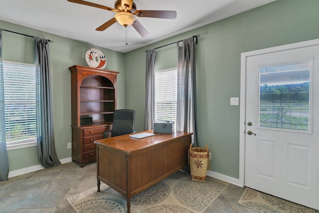 office area with ceiling fan