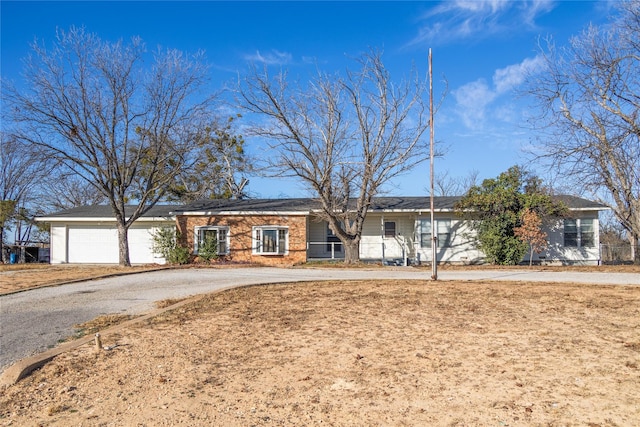 ranch-style home with a garage