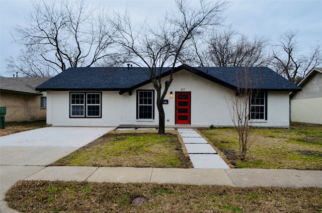 ranch-style house with a front yard