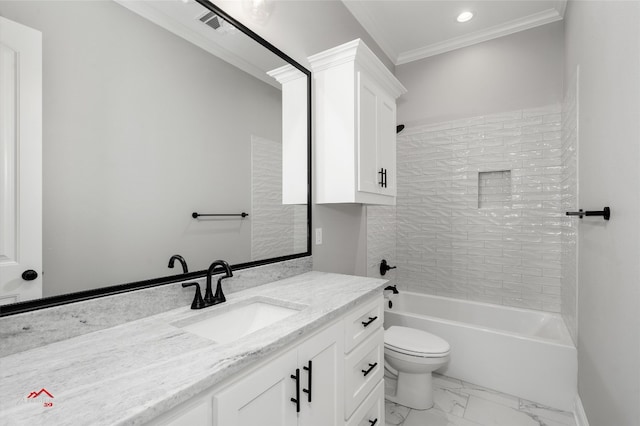 full bathroom with vanity, tiled shower / bath, ornamental molding, and toilet