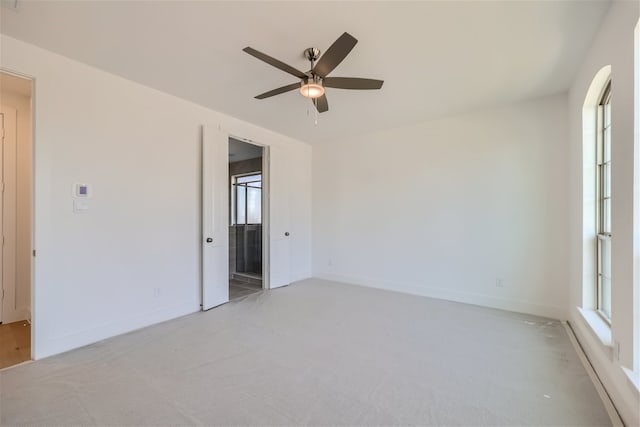 empty room featuring ceiling fan