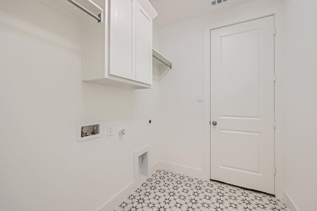 laundry room with hookup for an electric dryer, hookup for a washing machine, gas dryer hookup, and cabinets