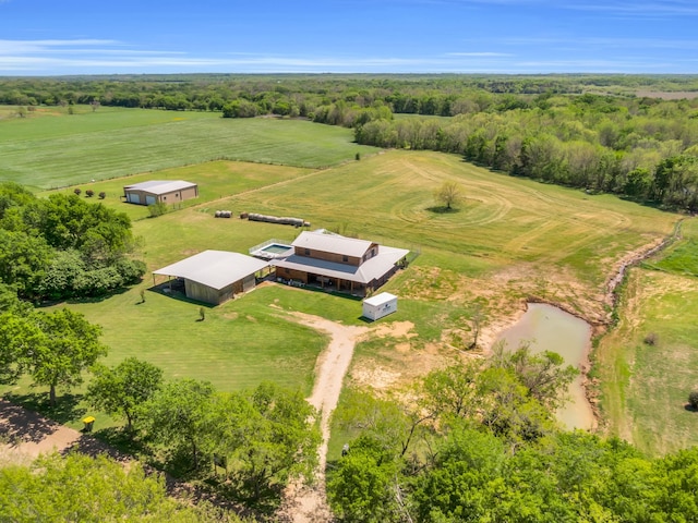 birds eye view of property featuring a rural view