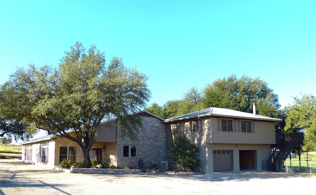 view of front of property featuring a garage