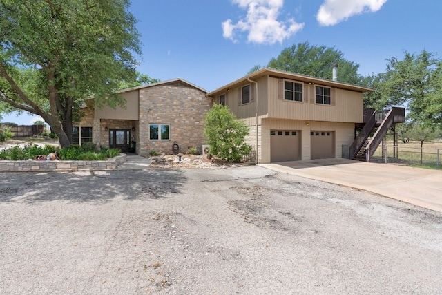 view of front of property featuring a garage