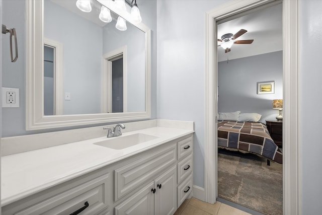 bathroom featuring vanity, ceiling fan, and tile patterned floors