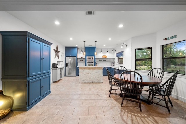 dining room with light tile patterned floors