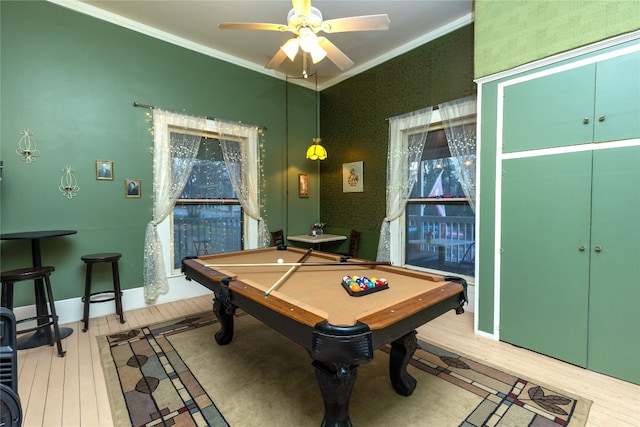 recreation room featuring pool table, ceiling fan, light hardwood / wood-style flooring, and crown molding