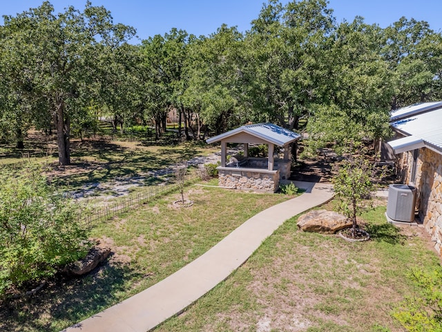 view of yard with a gazebo and central AC