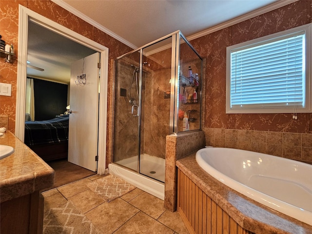 bathroom featuring tile patterned flooring, vanity, independent shower and bath, and ornamental molding