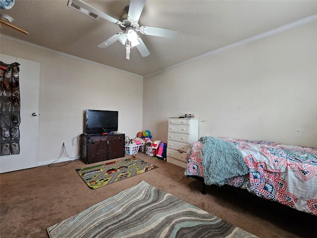 carpeted bedroom with ceiling fan and crown molding