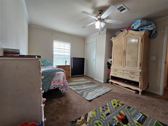 bedroom with carpet flooring, ceiling fan, a textured ceiling, and ornamental molding