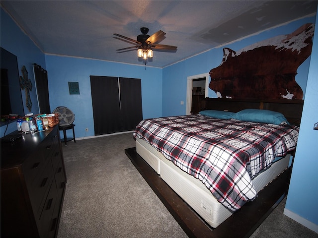 carpeted bedroom featuring ceiling fan