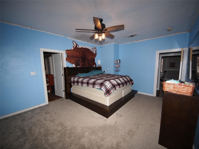 bedroom with carpet floors and ceiling fan