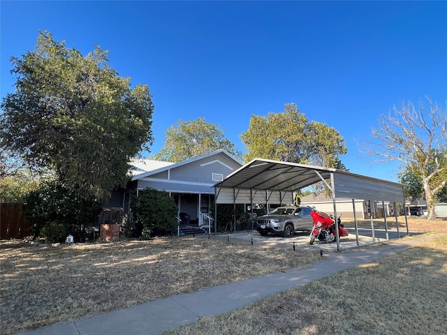 view of car parking with a carport