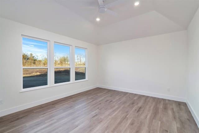 unfurnished room with ceiling fan, recessed lighting, light wood-type flooring, and baseboards