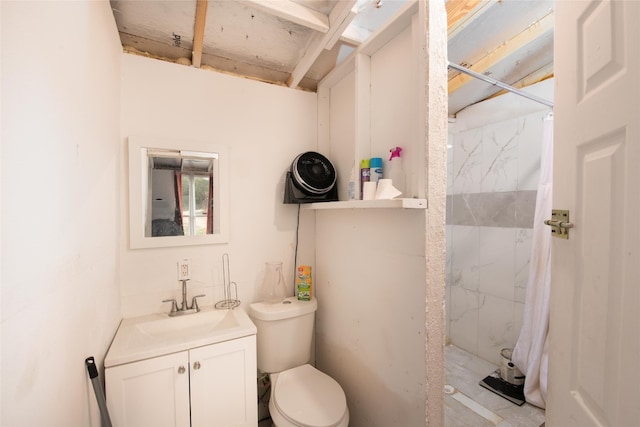 bathroom featuring toilet, walk in shower, and vanity