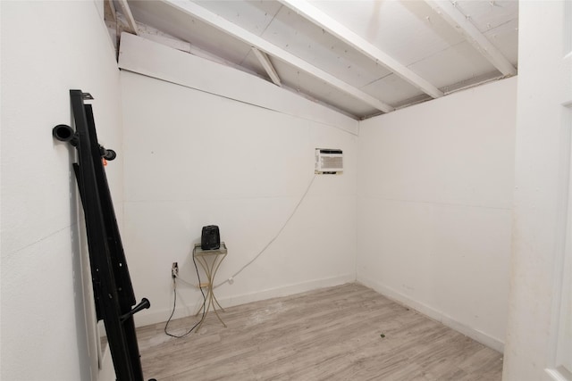 laundry area featuring light wood-type flooring