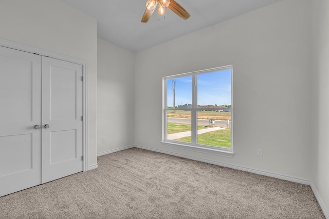 227 Rio Grande, Abilene, TX 79606 - unfurnished bedroom featuring carpet, a closet, ceiling fan, and vaulted ceiling