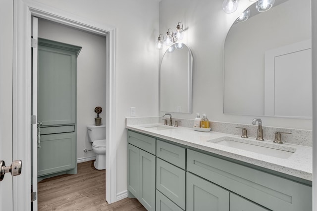 227 Rio Grande, Abilene, TX 79606 - full bath featuring double vanity and wood finished floors