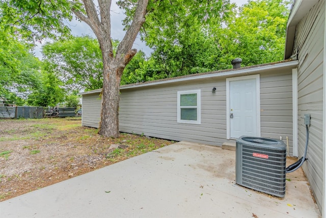 exterior space featuring central AC unit